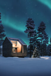 Sky Villa Antti exterior under the Northern Lights at Arcora