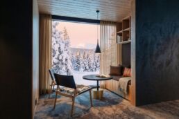 Arcora Boutique Hotel interior overlooking the snowy Lapland landscape